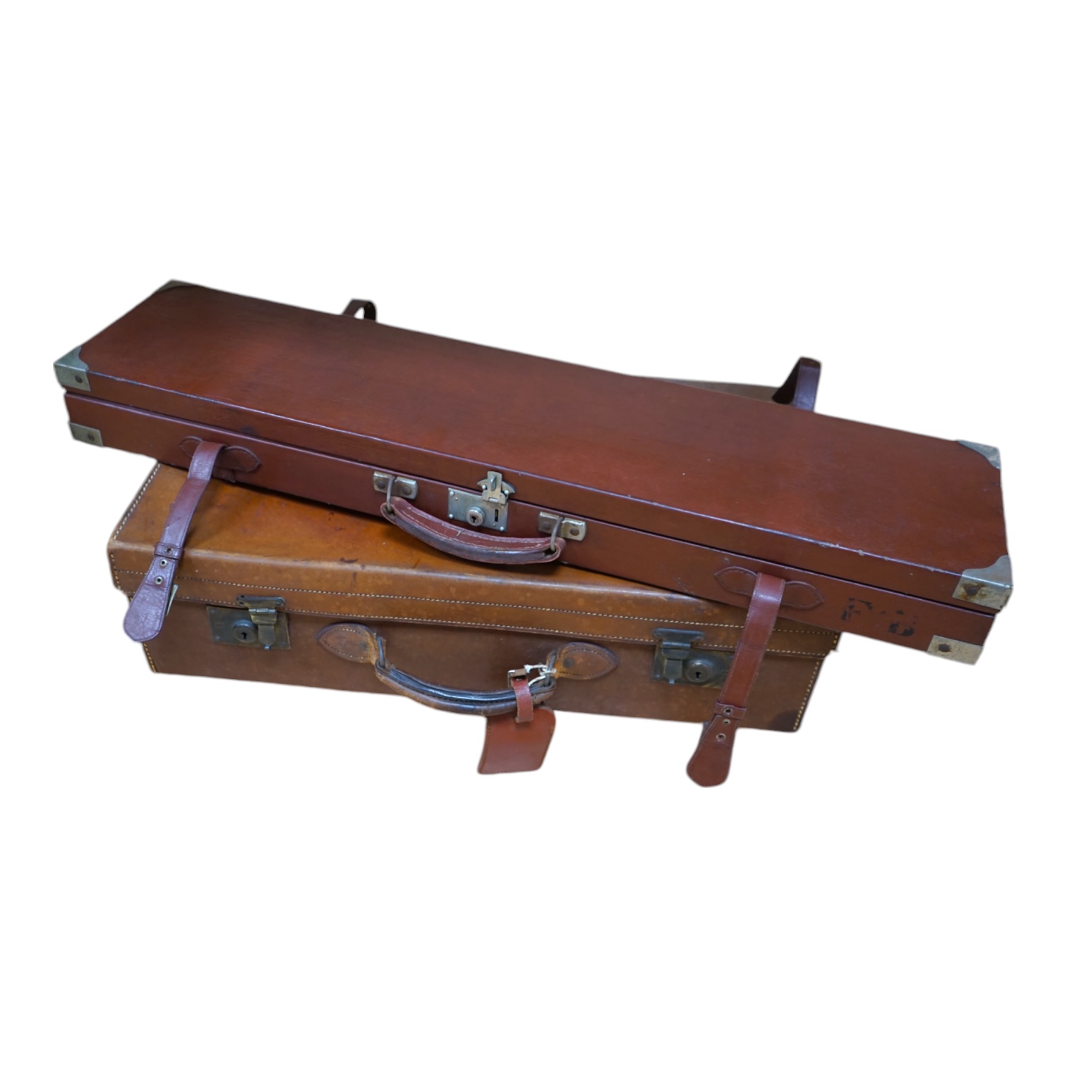 A gun case, various gun cleaning equipment and a brown leather suitcase. Condition - fair